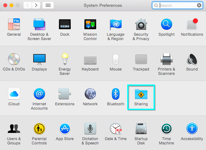 Menu Preferensi Sistem dengan ikon Berbagi disorot.